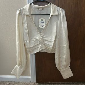 Cropped button down. Size small and cream color.